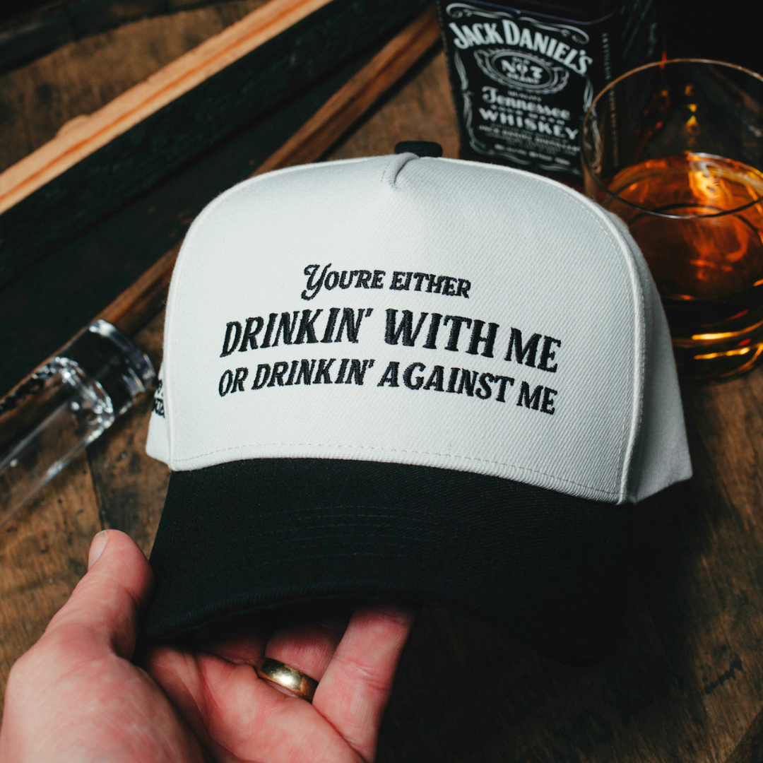 Drinkin' With Me Or Drinkin' Against Me